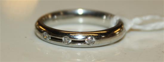 Diamond three-stone and platinum ring